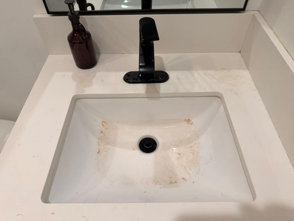 Bathroom sink before professional cleaning